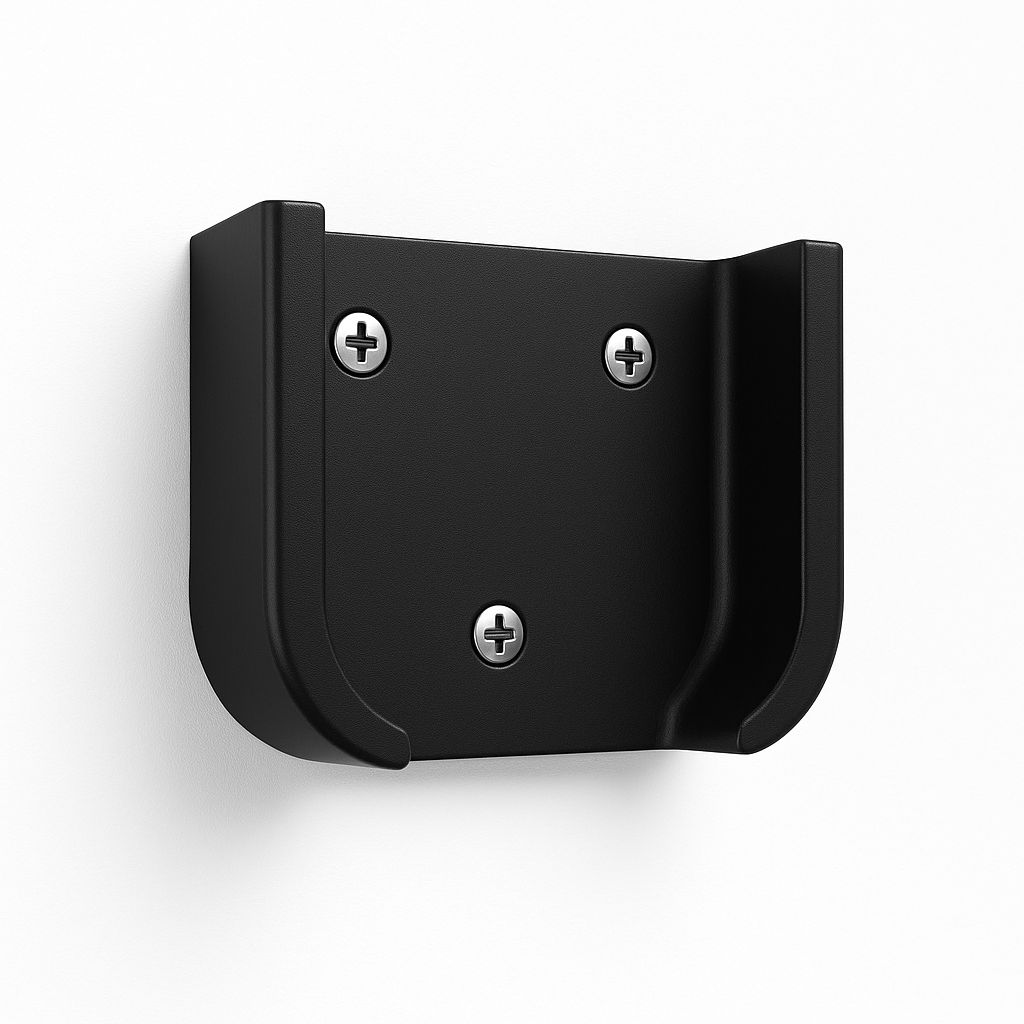 Apple TV mounted on the wall with the cable tucked away