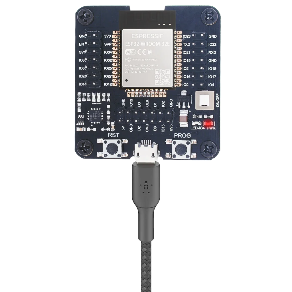 ESP-WROOM-32 module inserted into the programmer adapter