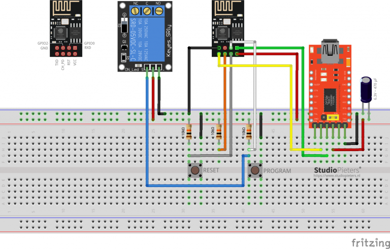 ESP8266-01S connected to an FTDI programmer with reset and program buttons