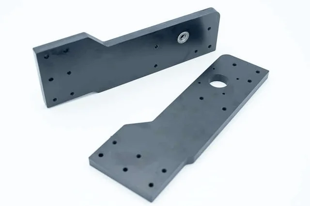 Two bakelite side plates