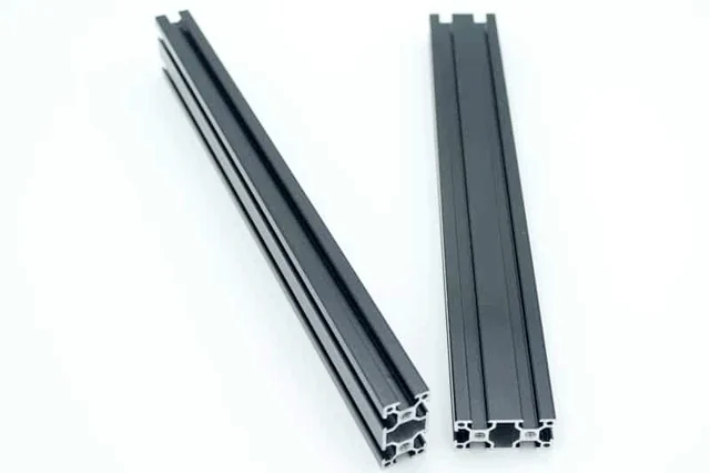 Two black aluminium profiles of a different kind