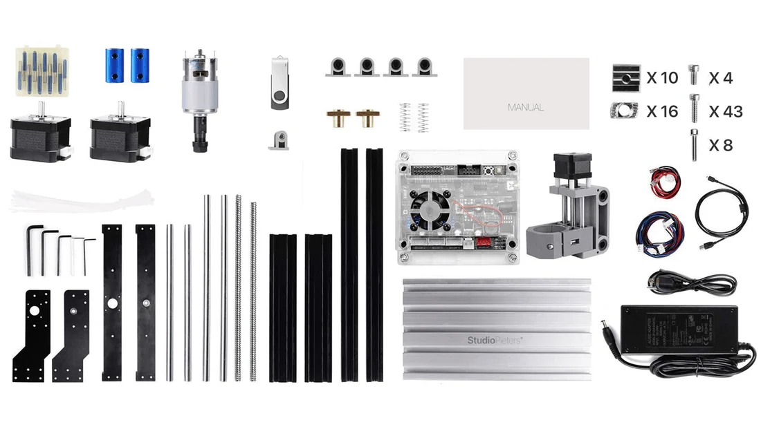 All parts of the kit laid out next to each other, with the number of screws