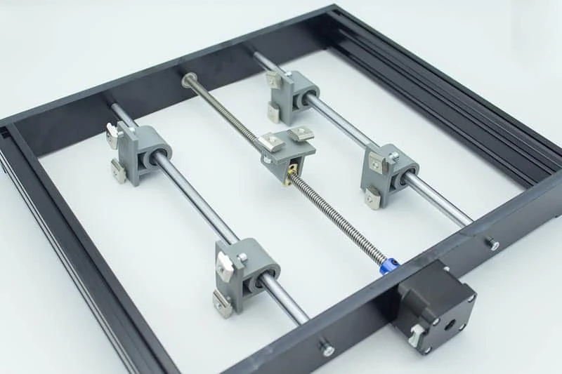 The frame with a lead screw, a stepper motor and the bearing holders