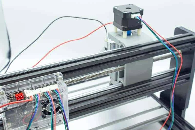 The cable of a stepper motor at the end of an axis
