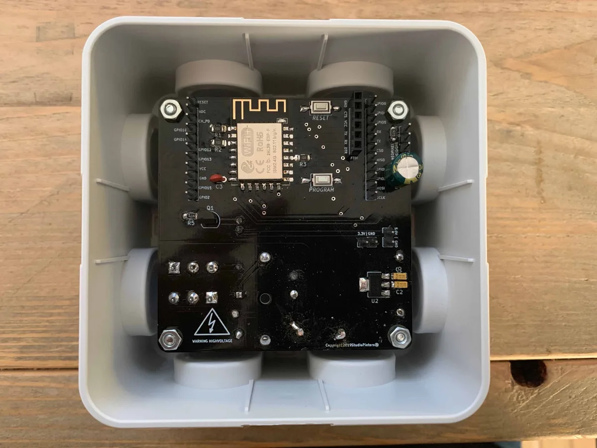 The assembled controller board fitted in the grey enclosure