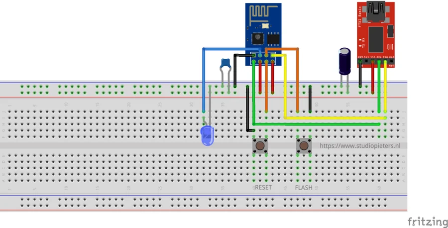 Diagram of an ESP-01 with a led, a capacitor and an FTDI adapter on a breadboard
