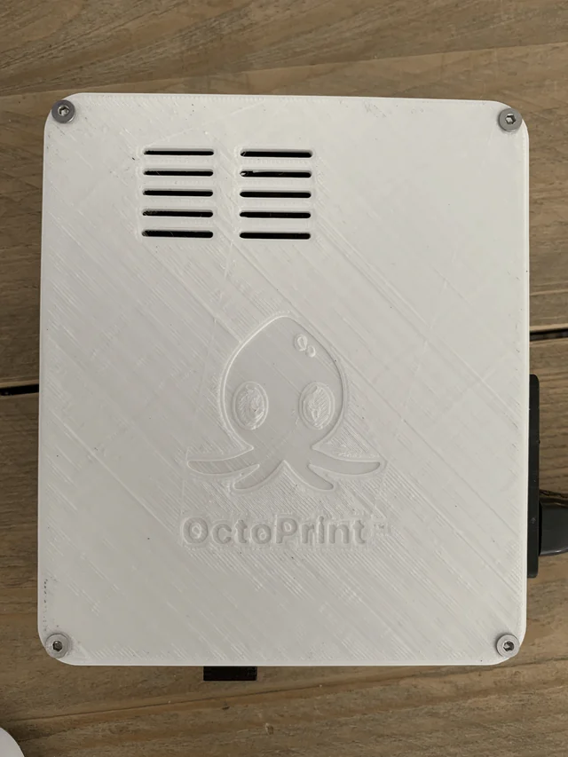 The printed lid with vents and the OctoPrint logo
