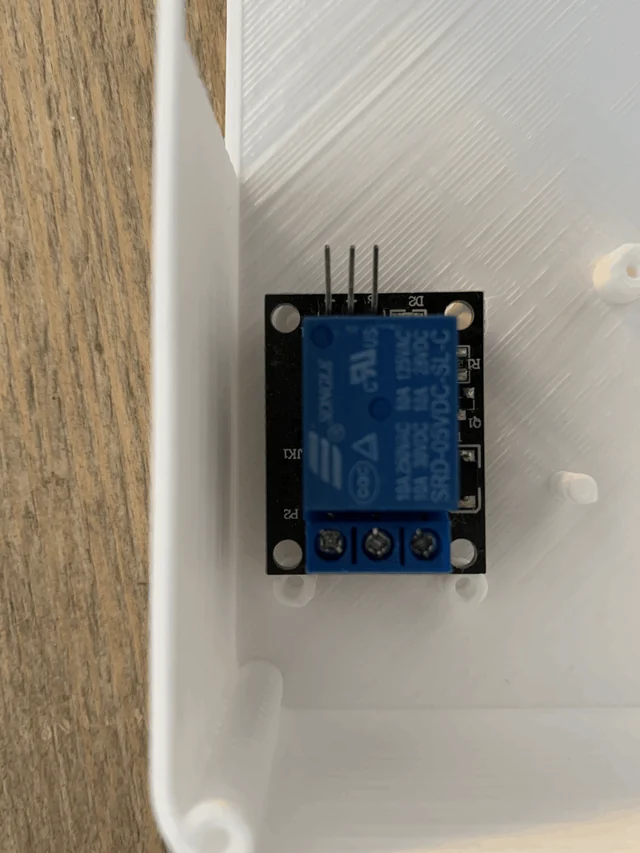 A relay module fitted in the printed base