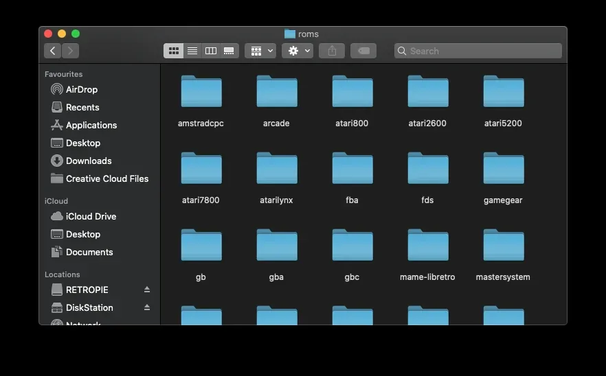 A Finder window with the folders of the roms folder, named after the game systems